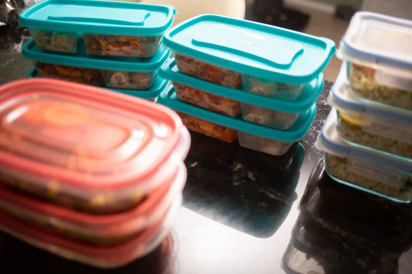 Meal prep portions packed into food storage containers