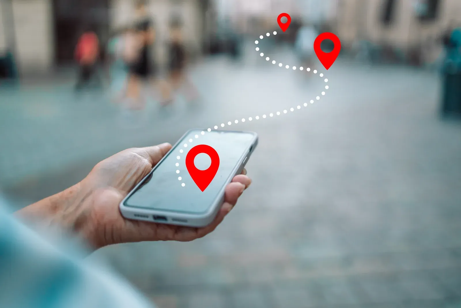 A phone showing a maps app while planning the drive to a nearby personal trainer