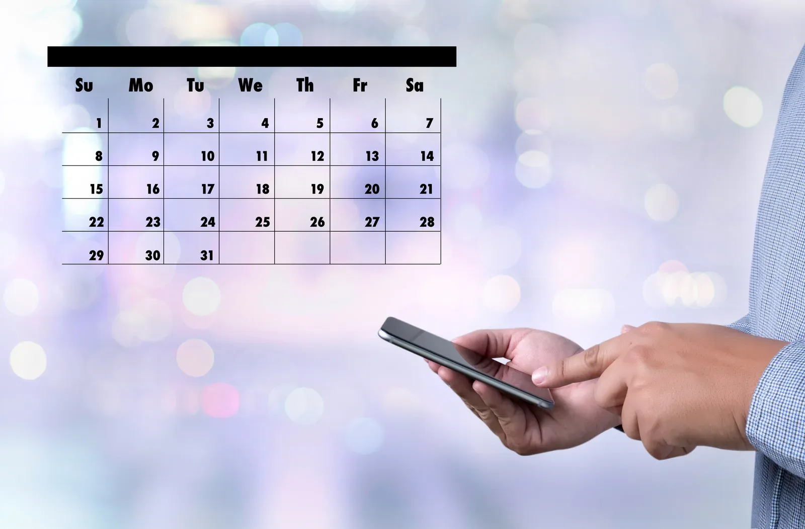 Appointment reminder marked in a paper calendar and organizer agenda
