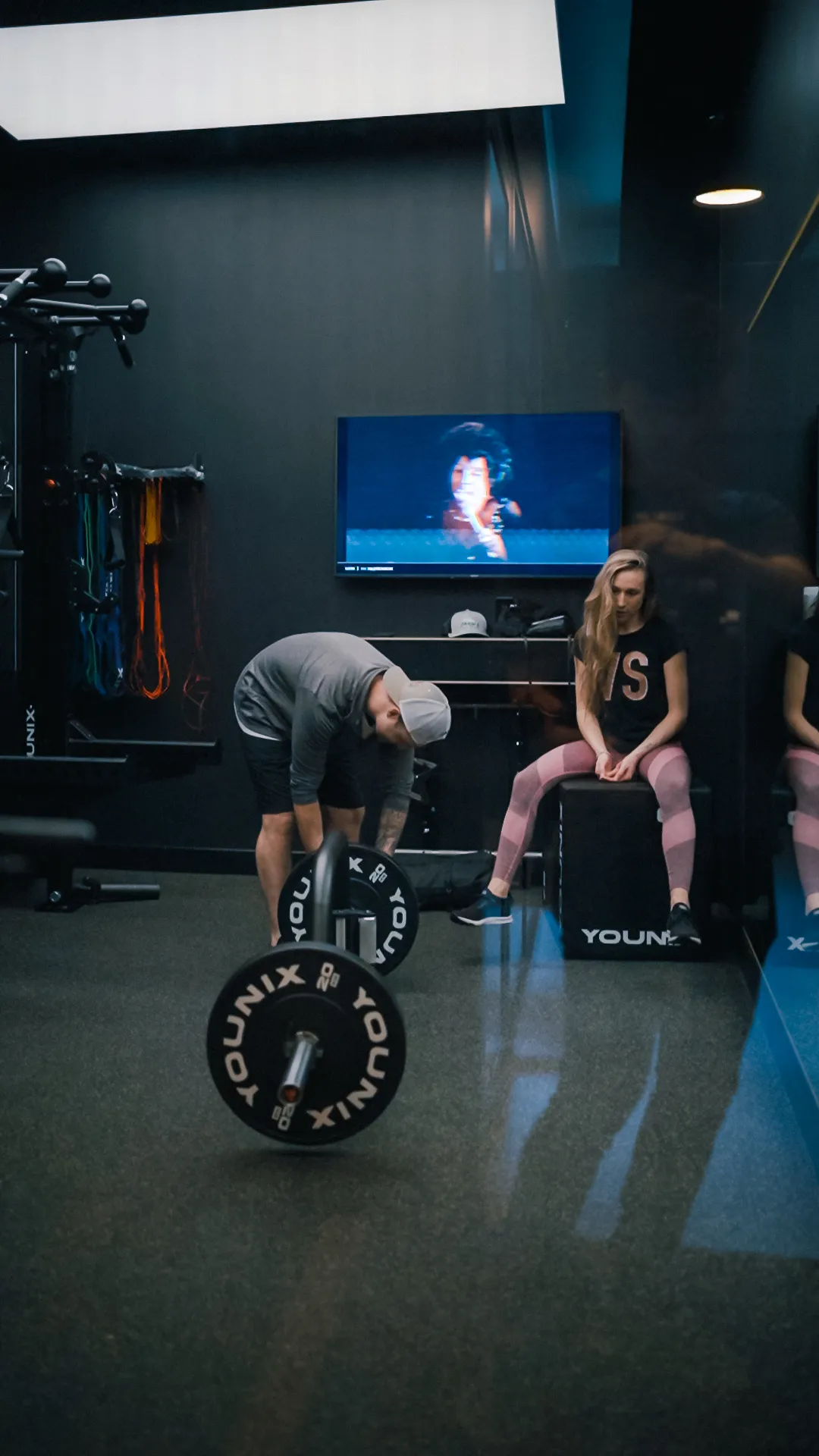 Two guests sharing a training session inside a private FlexWerk suite